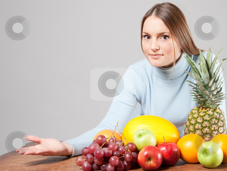 To use this stock image in your creative project, please select the size you need over to the right and click the "Add to Cart" button.
Your downloaded image will come with the Cutcaster watermark removed so don’t worry about the watermark you see on this page. Woman with fruits stock photo, Young adult woman with various colorful fruits by Ruta Balciunaite