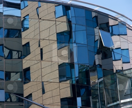 To use this stock image in your creative project, please select the size you need over to the right and click the "Add to Cart" button.
Your downloaded image will come with the Cutcaster watermark removed so don’t worry about the watermark you see on this page. Building stock photo, Detail of a modern glass office building by P?