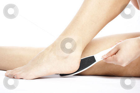 Heel scrubing Heel scrubing stock photo, Woman scrubs her heel by Igor Petrovi?