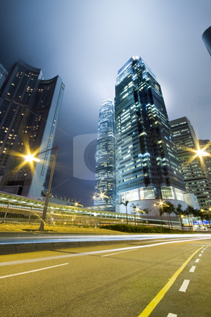 To use this stock image in your creative project, please select the size you need over to the right and click the "Add to Cart" button.
Your downloaded image will come with the Cutcaster watermark removed so don’t worry about the watermark you see on this page. Traffic through downtown in HongKong stock photo, Hong Kong at night with highrise buildings by Keng po Leung