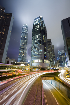To use this stock image in your creative project, please select the size you need over to the right and click the "Add to Cart" button.
Your downloaded image will come with the Cutcaster watermark removed so don’t worry about the watermark you see on this page. Traffic through downtown in HongKong stock photo, Hong Kong at night with highrise buildings by Keng po Leung
