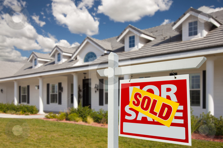 Sold Real Estate Sign and House - Right Sold Real Estate Sign and House - Right stock photo, Sold Home For Sale Real Estate Sign in Front of New House - Right Facing. by Andy Dean