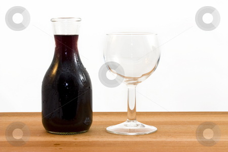To use this stock image in your creative project, please select the size you need over to the right and click the "Add to Cart" button.
Your downloaded image will come with the Cutcaster watermark removed so don’t worry about the watermark you see on this page. Wine stock photo, Photo of a bottle of red wine and a glass by Sabino Parente