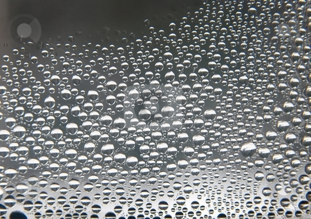 To use this stock image in your creative project, please select the size you need over to the right and click the "Add to Cart" button.
Your downloaded image will come with the Cutcaster watermark removed so don’t worry about the watermark you see on this page. Droplets stock photo, Small water droplets on a window by P?
