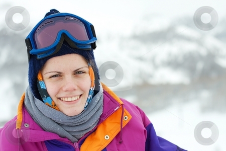 To use this stock image in your creative project, please select the size you need over to the right and click the "Add to Cart" button.
Your downloaded image will come with the Cutcaster watermark removed so don’t worry about the watermark you see on this page. Skier stock photo, Portrait of a young, smiling female skier by P?