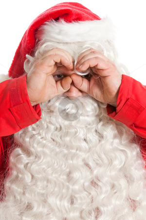 To use this stock image in your creative project, please select the size you need over to the right and click the "Add to Cart" button.
Your downloaded image will come with the Cutcaster watermark removed so don’t worry about the watermark you see on this page. Funny Santa Claus stock photo, Funny Santa Claus looking through hand's binocular by Ruta Balciunaite