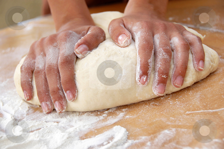 To use this stock image in your creative project, please select the size you need over to the right and click the "Add to Cart" button.
Your downloaded image will come with the Cutcaster watermark removed so don’t worry about the watermark you see on this page. Kneading dough stock photo, Female hands in flour closeup kneading dough on table by Julija Sapic