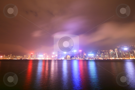 To use this stock image in your creative project, please select the size you need over to the right and click the "Add to Cart" button.
Your downloaded image will come with the Cutcaster watermark removed so don’t worry about the watermark you see on this page. Hong Kong By Night stock photo, Hong Kong City Lights By Night Reflecting On Water by Nick Fingerhut