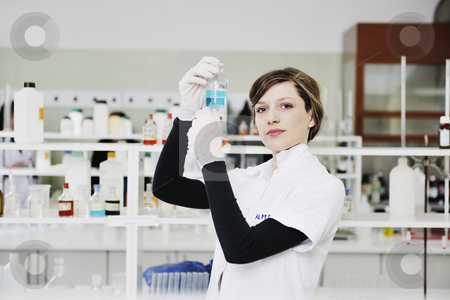 Young woman in lab Young woman in lab stock photo, Science chemistry classes with young student woman in labaratory by Benis Arapovic