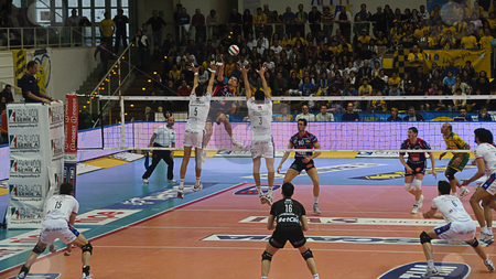 To use this stock image in your creative project, please select the size you need over to the right and click the "Add to Cart" button.
Your downloaded image will come with the Cutcaster watermark removed so don’t worry about the watermark you see on this page. Italian male volley Championship 2009/2010 - ITAS Diatec Trenti stock photo, Game 1 of Playoff Semifinals between ITAS Diatec Trentino Volley and Lube Banca Marche Macerata. Igor Omrcen hitting the ball against Trento block Photo taken on the 18th of April, 2010. by Alessandro Rizzolli
