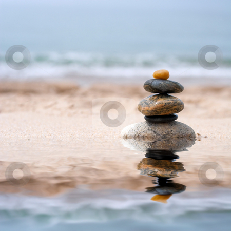 Smooth Stacked Stones Smooth Stacked Stones stock photo, A pile of round smooth zen like stones stacked in the sand at the beach. by Todd Arena