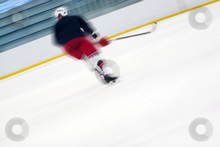 To use this stock image in your creative project, please select the size you need over to the right and click the "Add to Cart" button.
Your downloaded image will come with the Cutcaster watermark removed so don’t worry about the watermark you see on this page. Hockey Player Abtract stock photo, Abstract motion blur of a hockey player as he skates down the ice. Slight motion blur and shallow depth of field. by Todd Arena