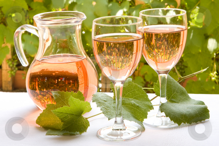 To use this stock image in your creative project, please select the size you need over to the right and click the "Add to Cart" button.
Your downloaded image will come with the Cutcaster watermark removed so don’t worry about the watermark you see on this page. French rose wine stock photo, Two glasses of french rose wine against a background of grapevines by Anneke