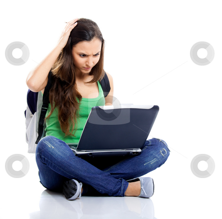 Worried female student Worried female student stock photo, Beautiful young female student sitting on floor studying on a laptop, isolated on white by ikostudio