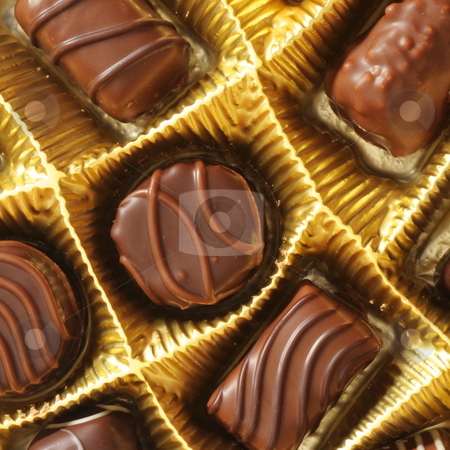 To use this stock image in your creative project, please select the size you need over to the right and click the "Add to Cart" button.
Your downloaded image will come with the Cutcaster watermark removed so don’t worry about the watermark you see on this page. Chocolate stock photo, Chocolate addiction concept with praline present box by Gunnar Pippel