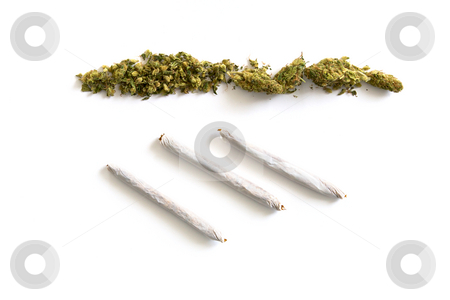 Pot and joints Pot and joints stock photo, Pile of medical marijuana stretches across the top of the image and three joints are at an angle by Stephen Orsillo