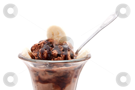 To use this stock image in your creative project, please select the size you need over to the right and click the "Add to Cart" button.
Your downloaded image will come with the Cutcaster watermark removed so don’t worry about the watermark you see on this page. Chocolate Ice Cream Sundae stock photo, A delicious chocolate ice cream sundae with bananas isolated over a white background. by Todd Arena
