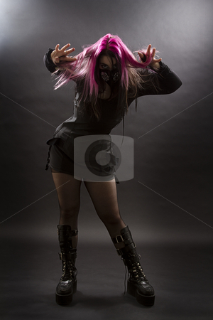 To use this stock image in your creative project, please select the size you need over to the right and click the "Add to Cart" button.
Your downloaded image will come with the Cutcaster watermark removed so don’t worry about the watermark you see on this page. Psycho goth girl stock photo, Maniacal looking goth girl with pink hair and body piercing pulling her hair by Yann Poirier
