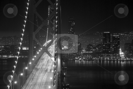 To use this stock image in your creative project, please select the size you need over to the right and click the "Add to Cart" button.
Your downloaded image will come with the Cutcaster watermark removed so don’t worry about the watermark you see on this page. Bay Bridge stock photo, Shot from Yerba Buena Island looking at the Bay Bridge into the city of San Francisco. by Gregory Smith