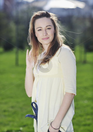 Young woman outdoor portrait Young woman outdoor portrait stock photo, Happy young beautiful woman face closeup and portrait outdoor at sunny day by Benis Arapovic