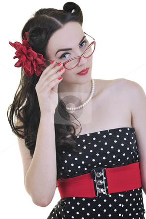 To use this stock image in your creative project, please select the size you need over to the right and click the "Add to Cart" button.
Your downloaded image will come with the Cutcaster watermark removed so don’t worry about the watermark you see on this page. Pinup fashion stock photo, Pretty happy young pinup girl isolated on white in studio representing old fashion concept and style by Benis Arapovic