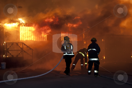 To use this stock image in your creative project, please select the size you need over to the right and click the "Add to Cart" button.
Your downloaded image will come with the Cutcaster watermark removed so don’t worry about the watermark you see on this page. Danger work stock photo, Silhouette of firefighters by Dmitry Pistrov
