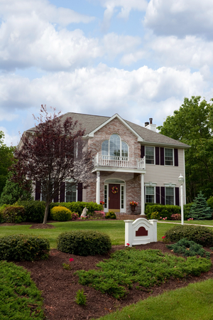 To use this stock image in your creative project, please select the size you need over to the right and click the "Add to Cart" button.
Your downloaded image will come with the Cutcaster watermark removed so don’t worry about the watermark you see on this page. Modern Luxury House stock photo, A modern custom built luxury house in a residential neighborhood. This upper class home is a very nicely landscaped property. by Todd Arena