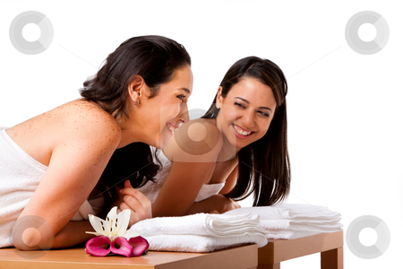 To use this stock image in your creative project, please select the size you need over to the right and click the "Add to Cart" button.
Your downloaded image will come with the Cutcaster watermark removed so don’t worry about the watermark you see on this page. Women having fun at spa stock photo, Two beautiful women friends laying on wooden tables with towels waiting for their massage in the spa, smiling laughing talking and having fun, isolated. by Paul Hakimata