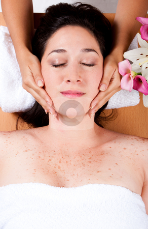 To use this stock image in your creative project, please select the size you need over to the right and click the "Add to Cart" button.
Your downloaded image will come with the Cutcaster watermark removed so don’t worry about the watermark you see on this page. Luxury facial massage stock photo, Skincare consultant applying fasial massage on beautiful woman at a spa salon. by Paul Hakimata