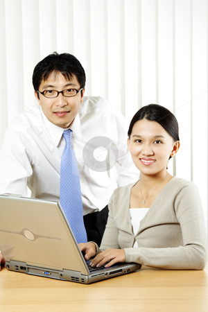 Business partners Business partners stock photo, A businessman and a businesswoman in an office by Suprijono Suharjoto
