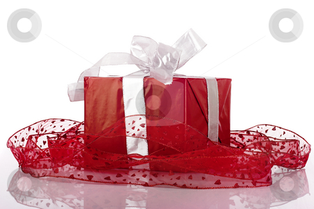 To use this stock image in your creative project, please select the size you need over to the right and click the "Add to Cart" button.
Your downloaded image will come with the Cutcaster watermark removed so don’t worry about the watermark you see on this page. Christmas box stock photo, Beautiful red Christmas box isolated on white with reflection by ikostudio