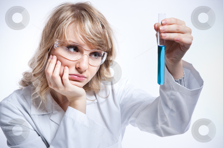 To use this stock image in your creative project, please select the size you need over to the right and click the "Add to Cart" button.
Your downloaded image will come with the Cutcaster watermark removed so don’t worry about the watermark you see on this page. Female scientist stock photo, A shot of a caucasian female scientist by Suprijono Suharjoto