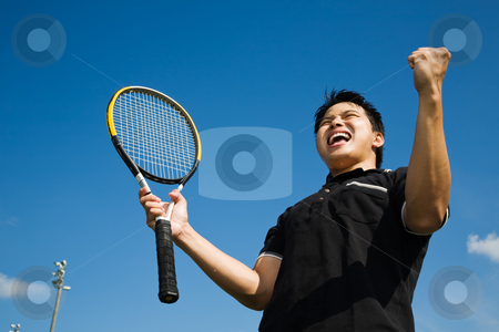 Asian tennis player joy in victory Asian tennis player joy in victory stock photo, A young sporty asian tennis player screaming in joy of victory by Suprijono Suharjoto