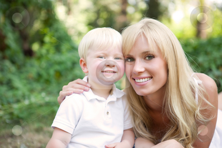 Happy caucasian mother and son Happy caucasian mother and son stock photo, A portrait of a happy caucasian mother with her son outdoor by Suprijono Suharjoto