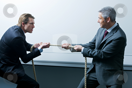 Business People Business People stock photo, Businessmen pulling on opposite ends of rope by Alexander Beck