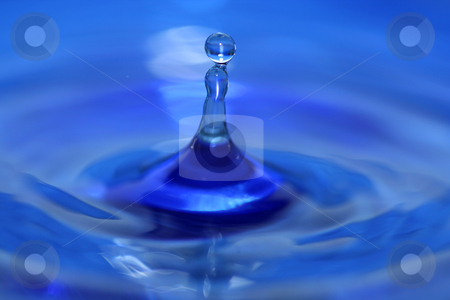 Water droplet splash Water droplet splash stock photo, A blue water droplet splashing by Jim Mills