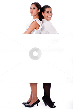 To use this stock image in your creative project, please select the size you need over to the right and click the "Add to Cart" button.
Your downloaded image will come with the Cutcaster watermark removed so don’t worry about the watermark you see on this page. Woman stabding back to back stock photo, Woman stabding back to back on isolated white background by Get4net