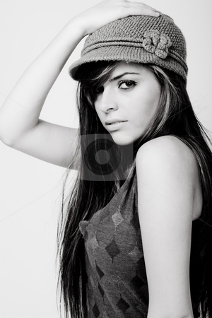To use this stock image in your creative project, please select the size you need over to the right and click the "Add to Cart" button.
Your downloaded image will come with the Cutcaster watermark removed so don’t worry about the watermark you see on this page. Closeup shot of a beautiful fashion model with a designer cap stock photo, Closeup shot of a beautiful fashion model with a designer cap by Get4net