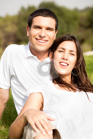 To use this stock image in your creative project, please select the size you need over to the right and click the "Add to Cart" button.
Your downloaded image will come with the Cutcaster watermark removed so don’t worry about the watermark you see on this page. Portrait of Happy young couple sitting and smiling stock photo, Portrait of Happy young couple sitting and smiling in the park by Get4net
