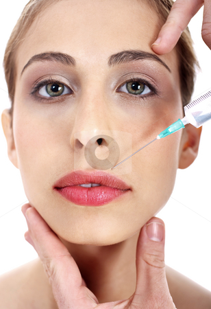 To use this stock image in your creative project, please select the size you need over to the right and click the "Add to Cart" button.
Your downloaded image will come with the Cutcaster watermark removed so don’t worry about the watermark you see on this page. Young woman being injected botox on her lips stock photo, Close up of a young woman being injected botox on her lips over isolated white baclground by Get4net
