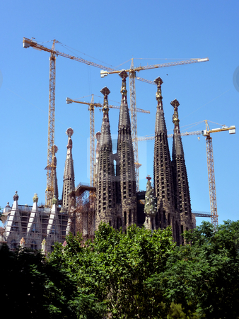 To use this stock image in your creative project, please select the size you need over to the right and click the "Add to Cart" button.
Your downloaded image will come with the Cutcaster watermark removed so don’t worry about the watermark you see on this page. Sagrada familia church in Barcelona, Spain stock photo, View of the back of the Sagrada familia church in Barcelona, Spain, with its towers and the cranes arround, by beautiful weather by Elenaphotos21