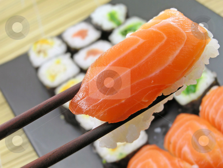 To use this stock image in your creative project, please select the size you need over to the right and click the "Add to Cart" button.
Your downloaded image will come with the Cutcaster watermark removed so don’t worry about the watermark you see on this page. Sushi stock photo, Sushi and chopsticks by Charles Taylor