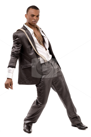 To use this stock image in your creative project, please select the size you need over to the right and click the "Add to Cart" button.
Your downloaded image will come with the Cutcaster watermark removed so don’t worry about the watermark you see on this page. Black fashion man posing at the camera stock photo, Black fashion man posing at the camera on a isolated white background by Get4net