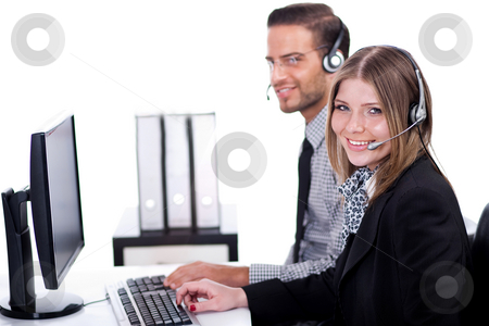 To use this stock image in your creative project, please select the size you need over to the right and click the "Add to Cart" button.
Your downloaded image will come with the Cutcaster watermark removed so don’t worry about the watermark you see on this page. Smiling executive operators stock photo, Smiling executive operators working together in their office by Get4net