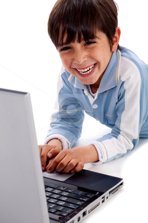 To use this stock image in your creative project, please select the size you need over to the right and click the "Add to Cart" button.
Your downloaded image will come with the Cutcaster watermark removed so don’t worry about the watermark you see on this page. Cute smiling caucasian kid with laptop stock photo, Cute smiling caucasian kid with laptop on isolated white background by Get4net
