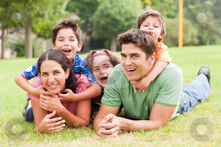 To use this stock image in your creative project, please select the size you need over to the right and click the "Add to Cart" button.
Your downloaded image will come with the Cutcaster watermark removed so don’t worry about the watermark you see on this page. Family lifestyle portrait stock photo, Family lifestyle portrait of a mum and dad having fun with their kids by Get4net