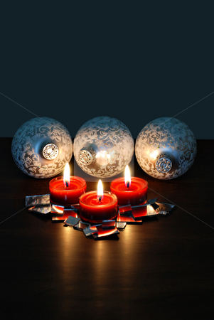 To use this stock image in your creative project, please select the size you need over to the right and click the "Add to Cart" button.
Your downloaded image will come with the Cutcaster watermark removed so don’t worry about the watermark you see on this page. Christmas ornaments stock photo, Christmas ornaments and candles by HD Connelly