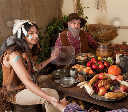 To use this stock image in your creative project, please select the size you need over to the right and click the "Add to Cart" button.
Your downloaded image will come with the Cutcaster watermark removed so don’t worry about the watermark you see on this page. Thanksgiving reenactment stock photo, Reenactment scene of the first Thanksgiving Dinner in Plymouth in 1621 with a Pilgrim family and a Wampanoag Indian by Anneke