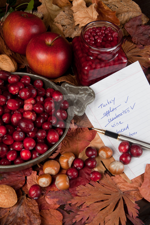 Shopping for thanksgiving day Shopping for thanksgiving day stock photo, Shopping list with thanksgiving ingredients, cranberries and apples by Anneke