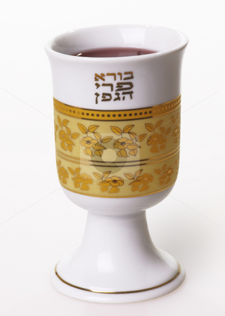 To use this stock image in your creative project, please select the size you need over to the right and click the "Add to Cart" button.
Your downloaded image will come with the Cutcaster watermark removed so don’t worry about the watermark you see on this page. Wine cup with the Hebrew blessing on wine stock photo, A decorated wine cup with the hebrew blessing on wine on friday evenings. by Boaz Yiftach